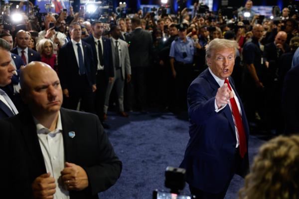Republican presidential nominee, former U.S. President Donald Trump speaks to reporters in the spin room after debating Democratic presidential nominee, U.S. Vice President Kamala Harris