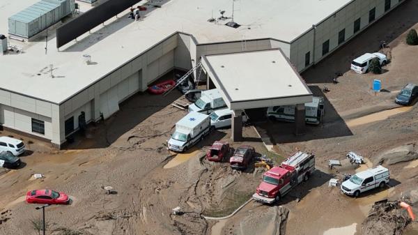 Flood damage caused by the storm that started as Hurricane Helene covering streets in Erwin, Tenn.